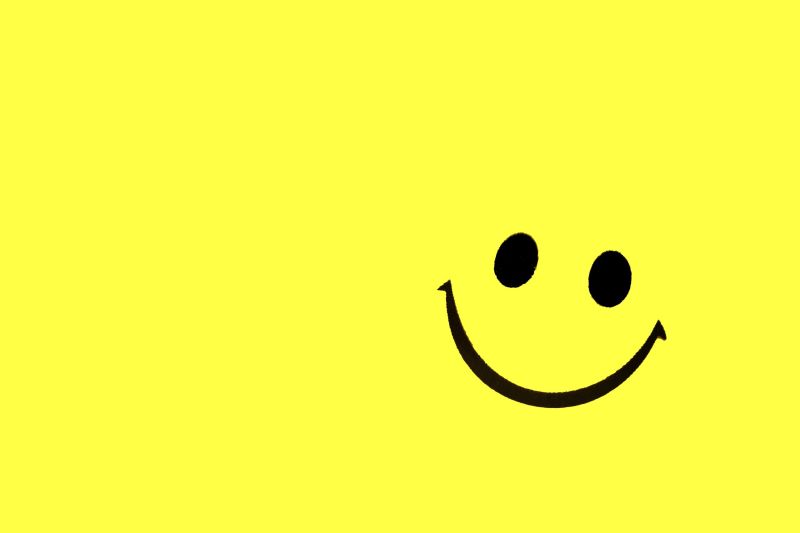 smiling-face-cartoon-on-yellow-background-minimal-2023-11-27-04-52-05-utc